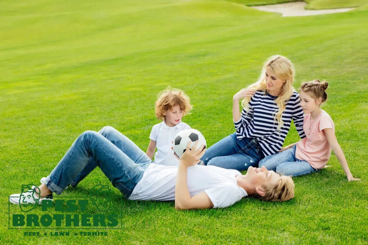 What Are the Benefits of Professional Lawn Care Compared to DIY Lawn Maintenance 2 family bonding in their lawn